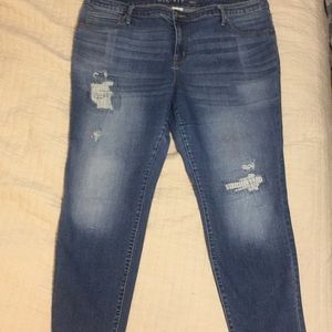 Distressed patch jeans